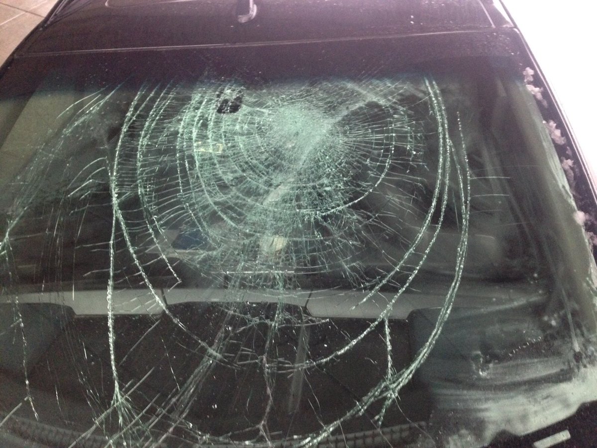 A smashed windshield on a vehicle