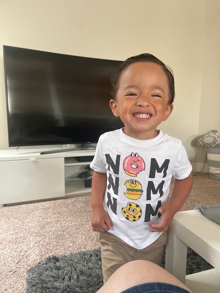 A picture of a smiling toddler