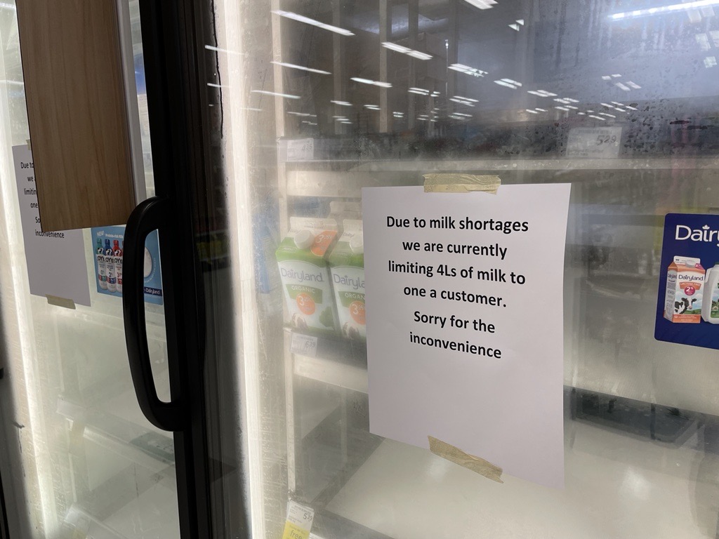 A photo of a sign in a Langley supermarket explaining a limit on milk purchases