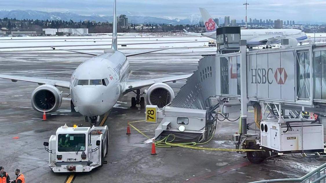 A collapsed aircraft loading bridge at Vancouver International Airport on Jan. 1, 2022.
