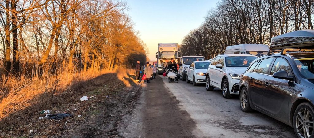 Many motorists ran out of fuel trying to leave Ukraine, and were forced to walk with their belongings several kilometres to the border. 