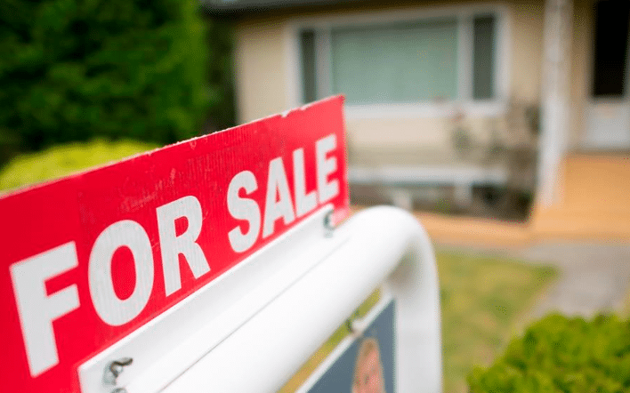 FILE - A real estate sign is pictured in Vancouver. (THE CANADIAN PRESS/ Jonathan Hayward)