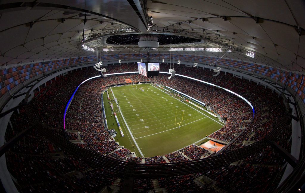 The B.C. Lions and Edmonton Eskimos play with the roof open at the renovated BC Place stadium during the first half of a CFL football game in Vancouver, B.C., on Friday September 30, 2011.
