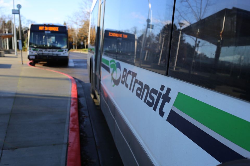 A BC Transit bus with the logo on the side