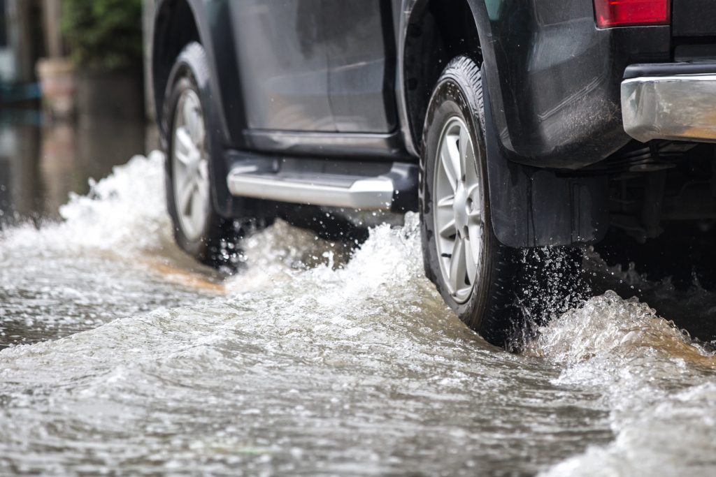 Pickup truck on a flooded street