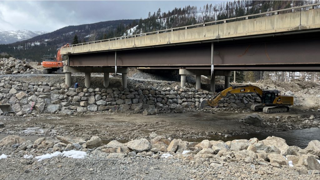 Crews work to repair a highway bridge