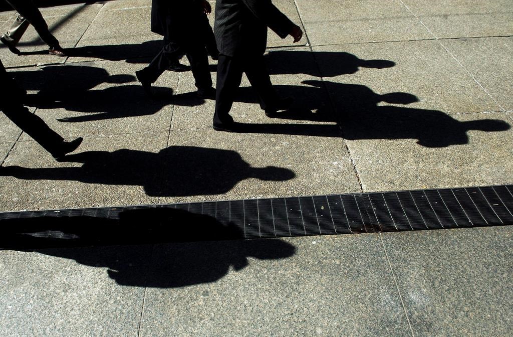 businessmen cast their shadows