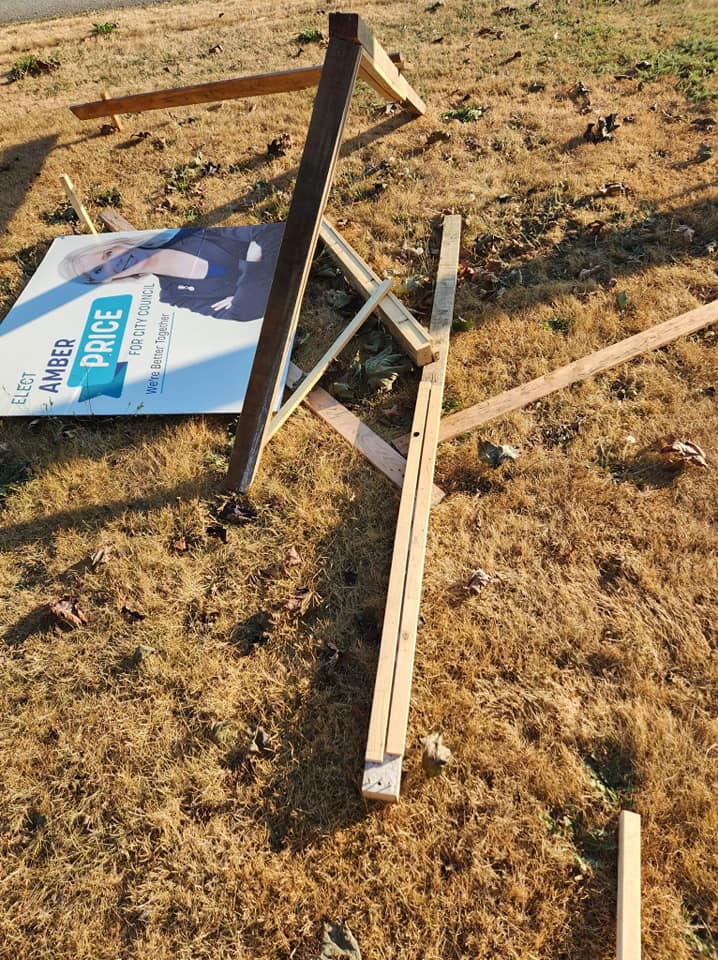 A campaign sign for Chilliwack city council candidate Amber Price is seen destroyed on the ground ahead of the 2022 municipal election