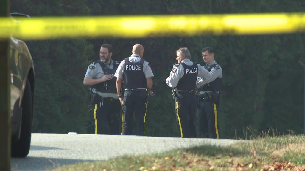 A large police presence along Canada Way in Burnaby after an RCMP officer was killed on the job