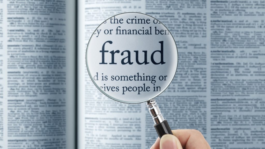 A stock image warning people about scams and fraud