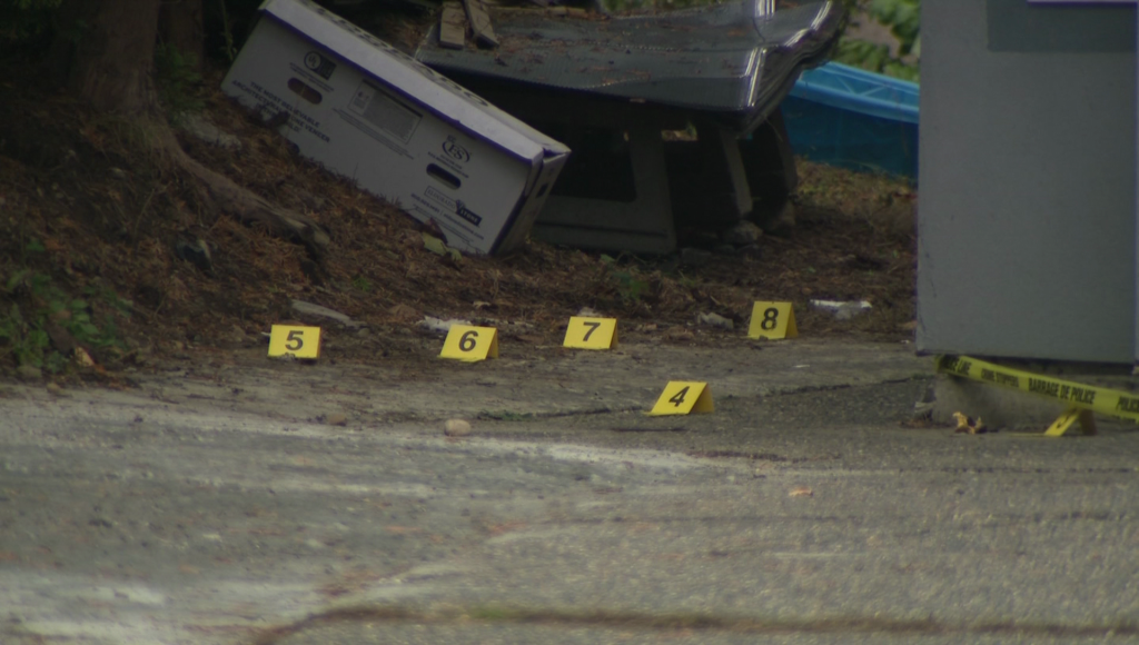 Evidence markers dot the ground