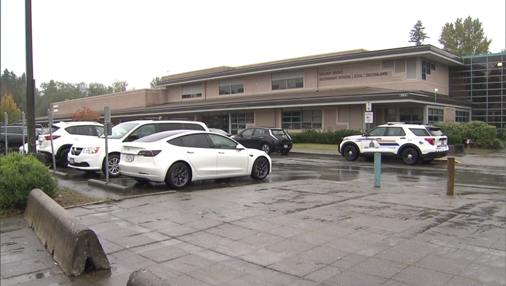 Police car in front of Walnut Grove Secondary School