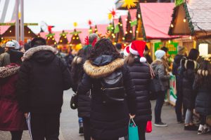VCM2019-KidsDay-PhotobyKyraCreative022 people walking through Christmas market