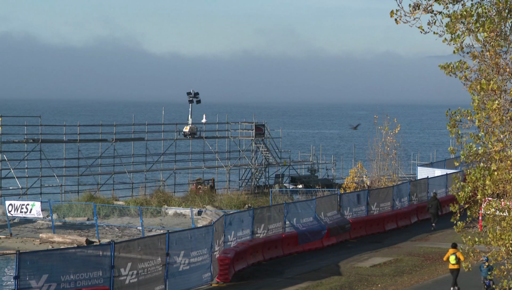 Beach and park with a construction site in the distance