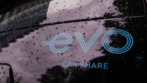 An Evo car share logo on a vehicle