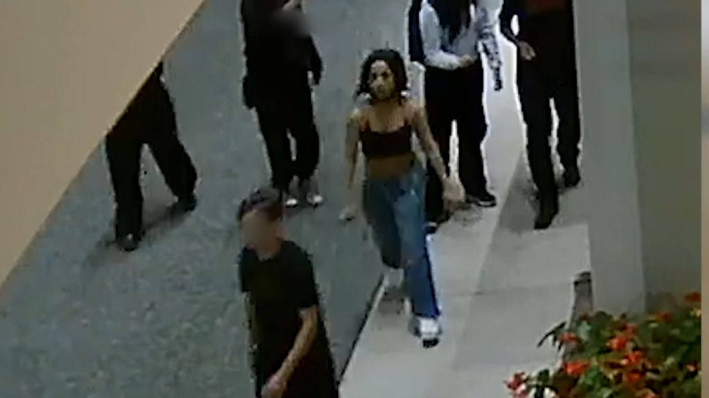 Security footage of a woman walking in downtown Vancouver whom police believe is involved in a September assault