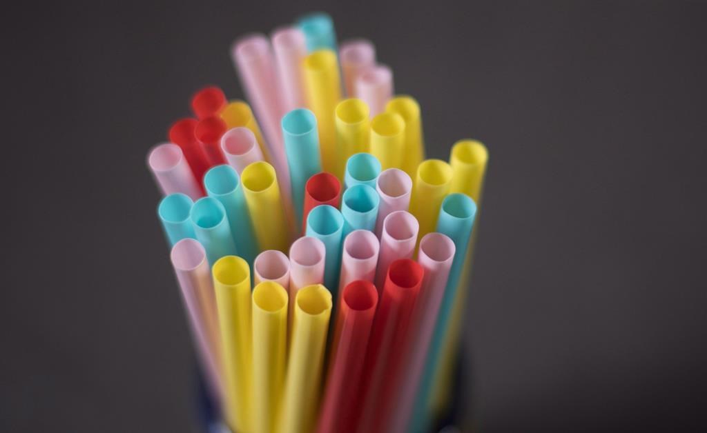 Straight plastic straws of various colours