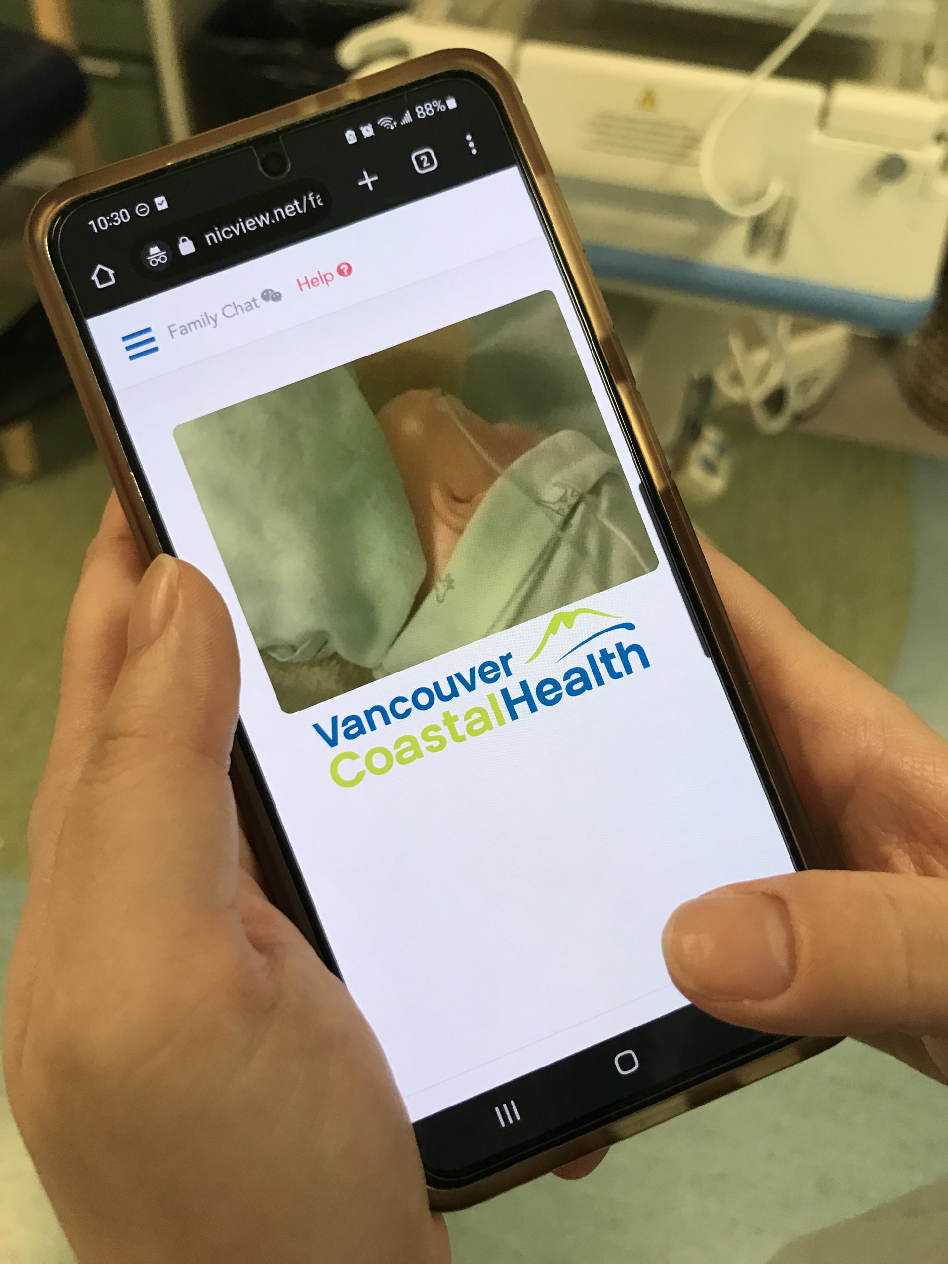 vch-infant-stream phone shows videostream of baby