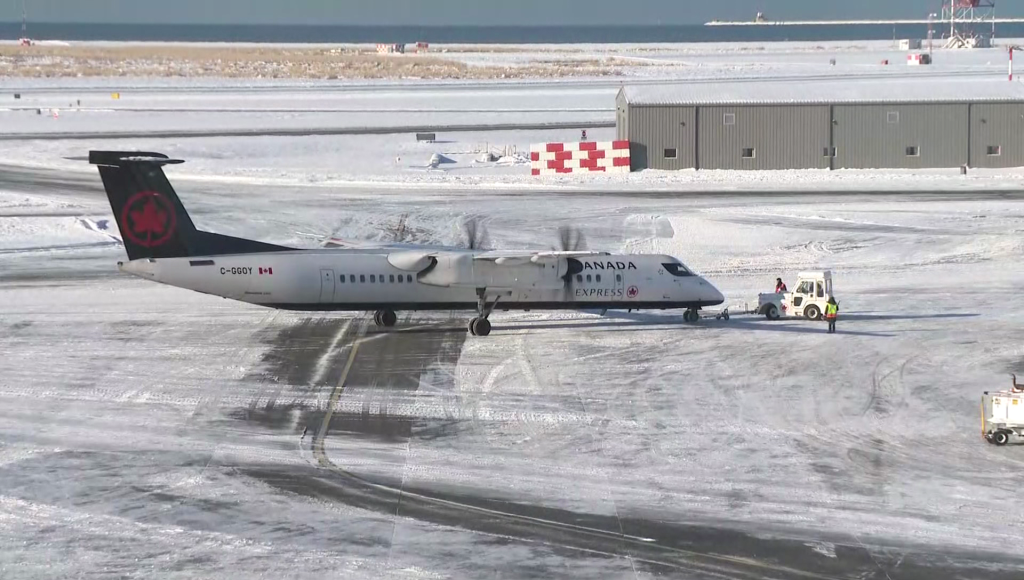 Air Canada plane on a snow covered runway