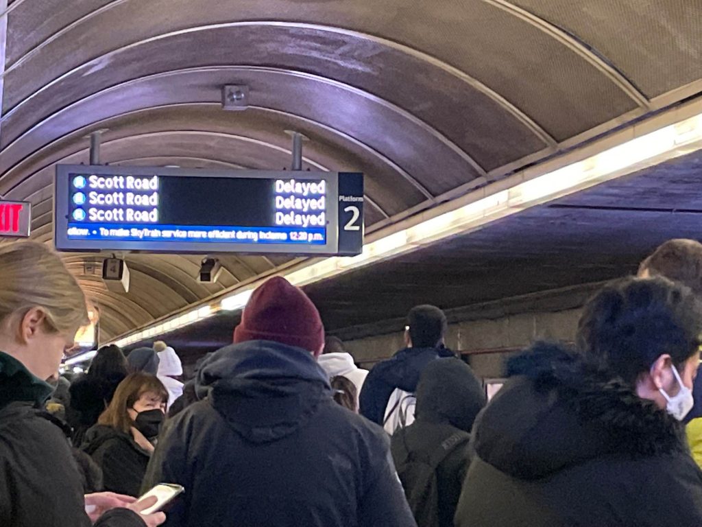 passengers waiting for train on platform