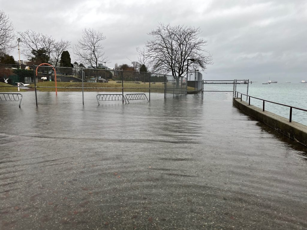 Some of the flooding seen in Vancouver's Kitsilano neighbourhood, as the region's low-lying areas are seeing water spill onto roadways, parks and sidewalks