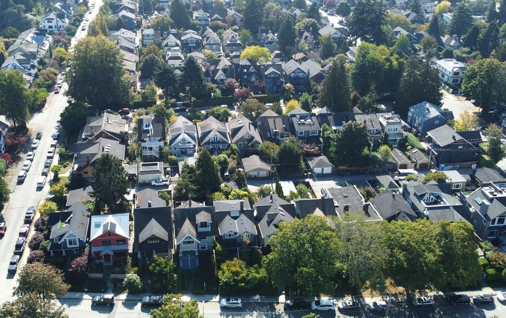 In this photo taken by a drone, Vancouver homes in the Kitsilano neighbourhood of Vancouver, B.C., is pictured Monday, Oct. 3, 2022.