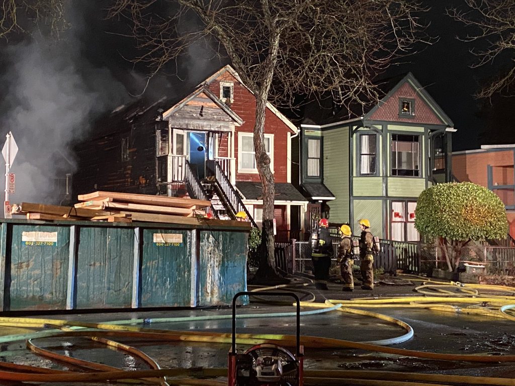 A Strathcona third alarm fire has damaged three houses near Maclean Park Wednesday morning. (CityNews Image/Mike Lloyd)