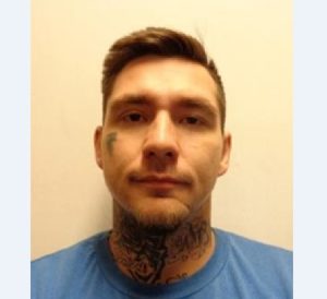 a man is wanted by police for manslaughter