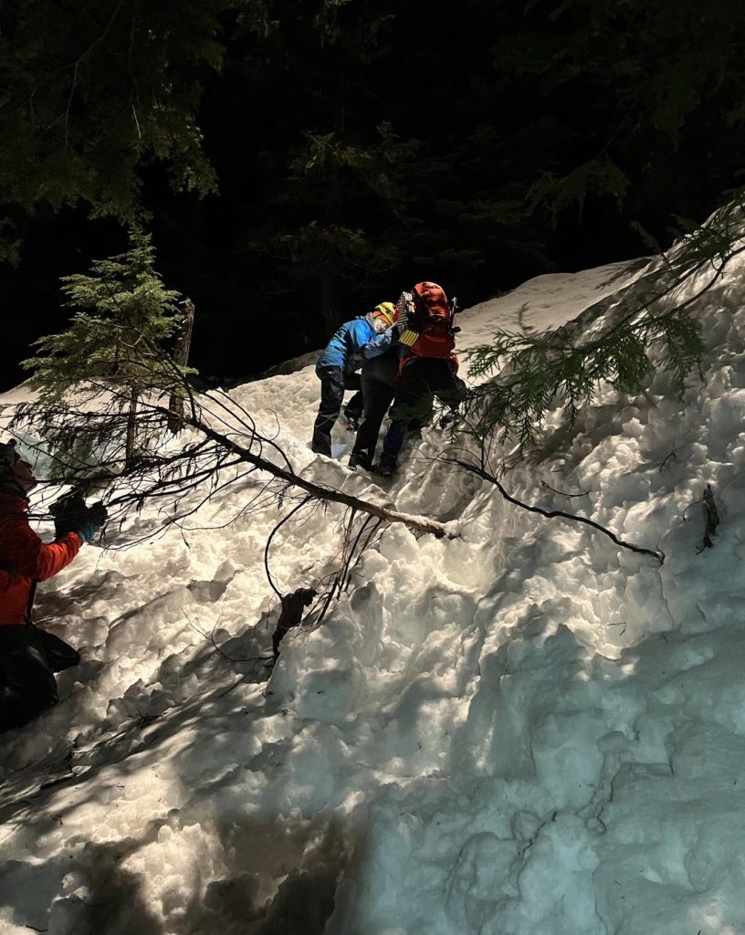 North Shore Rescue crews tending to hikers who were stranded at Lynn Peak