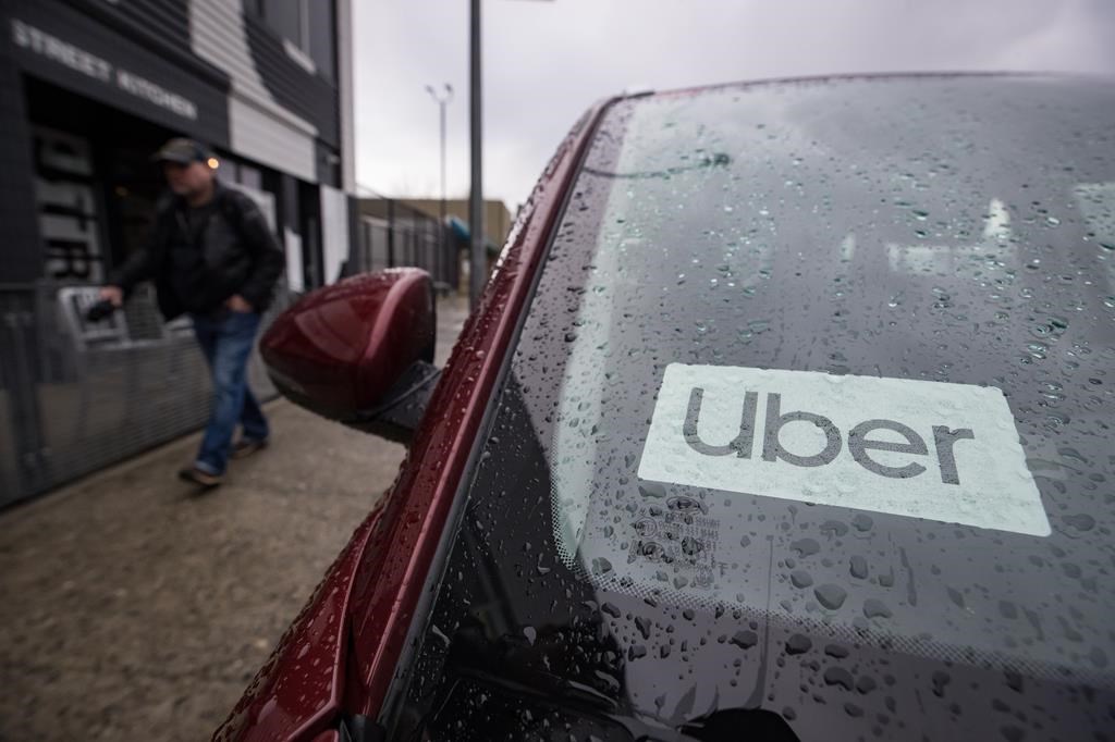An Uber driver's vehicle is seen after the company launched service, in Vancouver