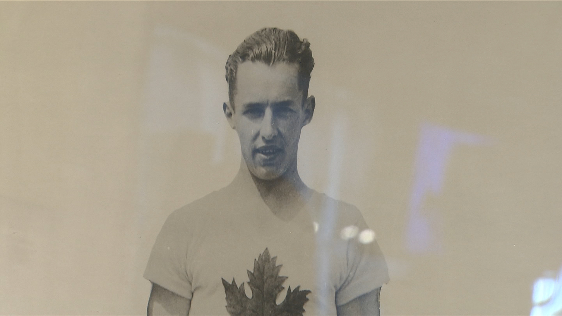 A photo of Percy Williams, Canadian sprinter and Olympian, stands at the BC Sports Hall of Fame in Vancouver