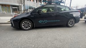 a parked evo ride share vehicle