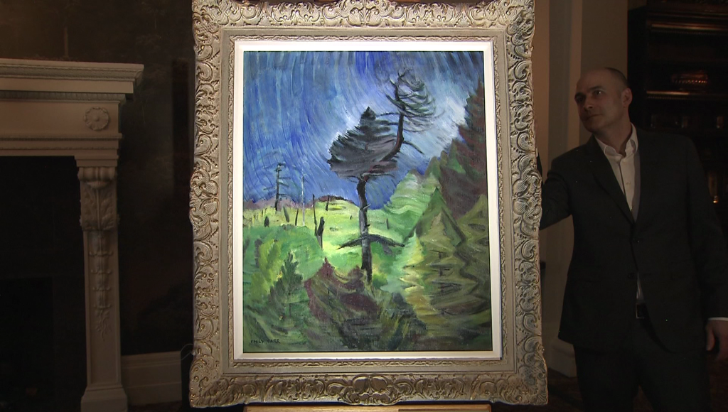 an emily carr painting depicitng greenery and trees