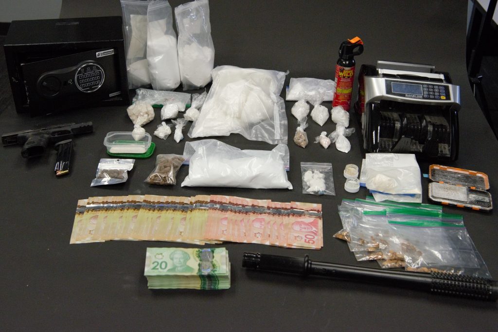 Police in New Westminster have seized drugs, cash, and cars as part of a drug trafficking investigation. (New Westminster Police Department)