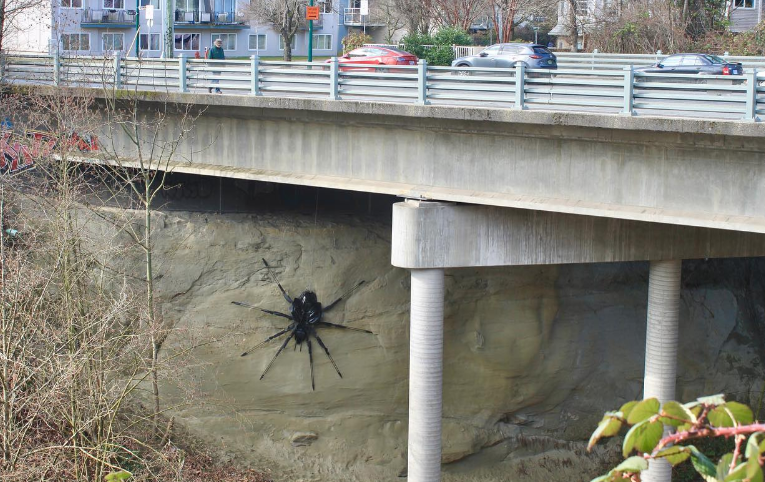 If you don't like spiders, you may want to avoid the area around Commercial Drive and Broadway in Vancouver. A very big art installation has been installed under the bridge near the SkyTrain Station. (Instagram/@junko.playtime)