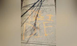 the message the nazi die was spray-painted in orange at a langley house