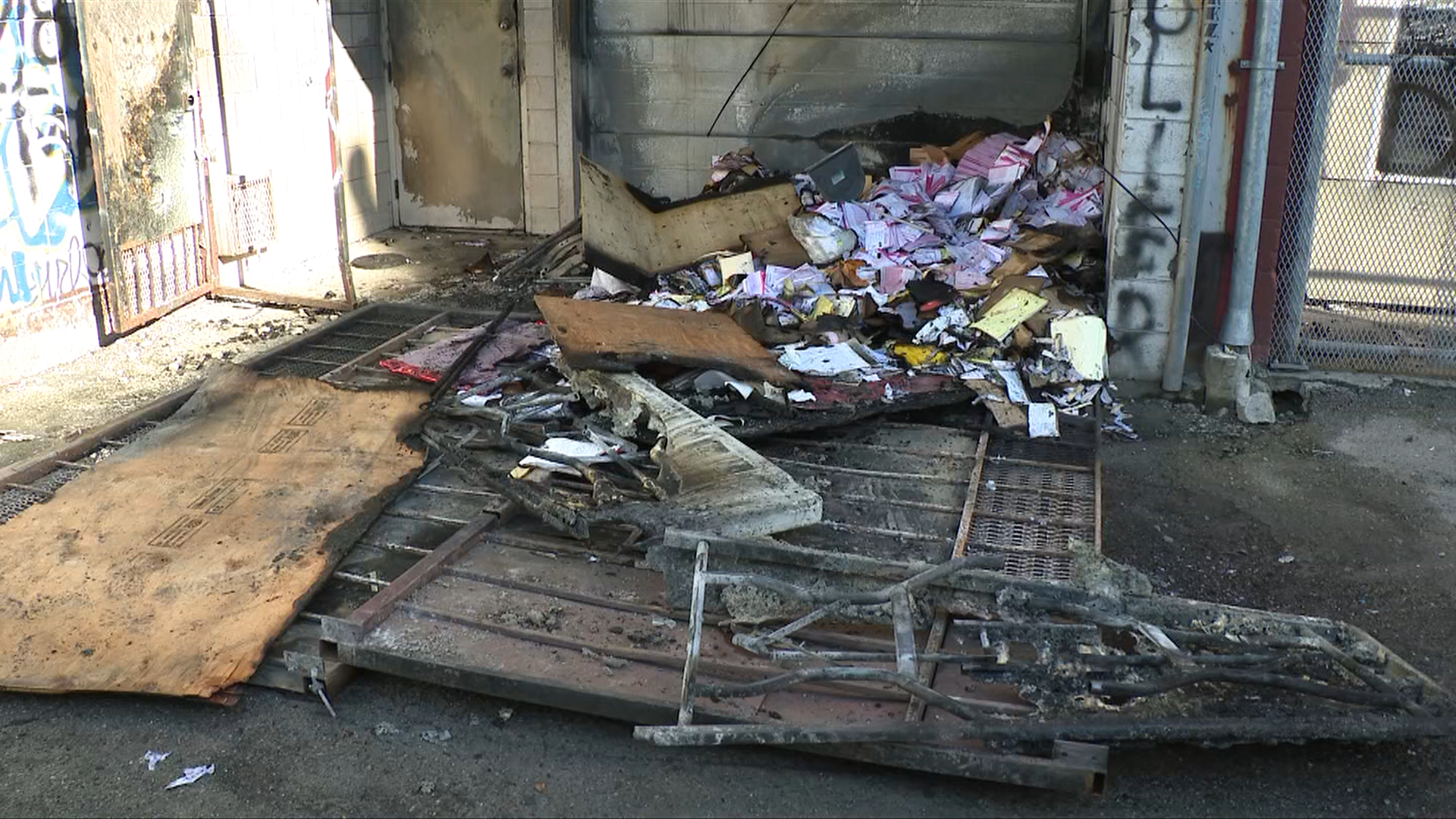 The charred remains of some office materials at the back of the Chinese Cultural Centre building after a fire Sunday night. 