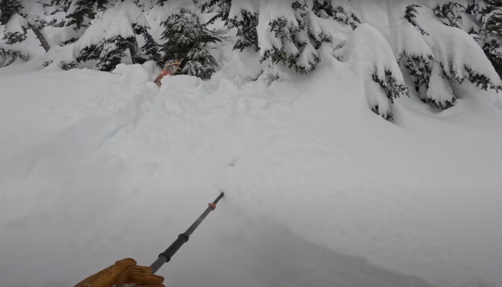 A heart-stopping, nightmare-like, video is making the rounds on social media showing the rescue of Mount Baker snowboarder who got caught in a tree well. (YouTube/Francis Zuber)
