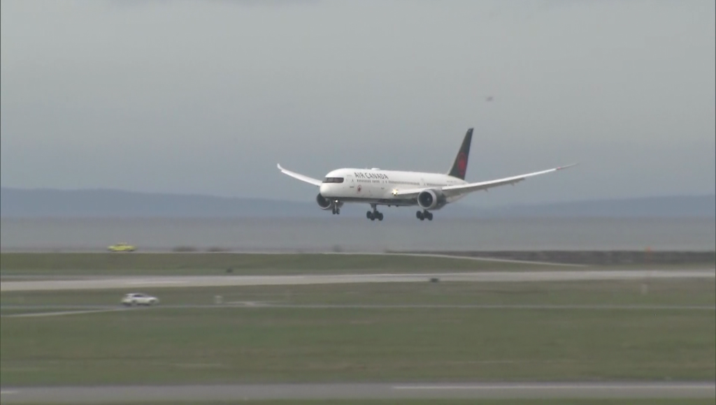 An Air Canada flight lands at Vancouver International Airport