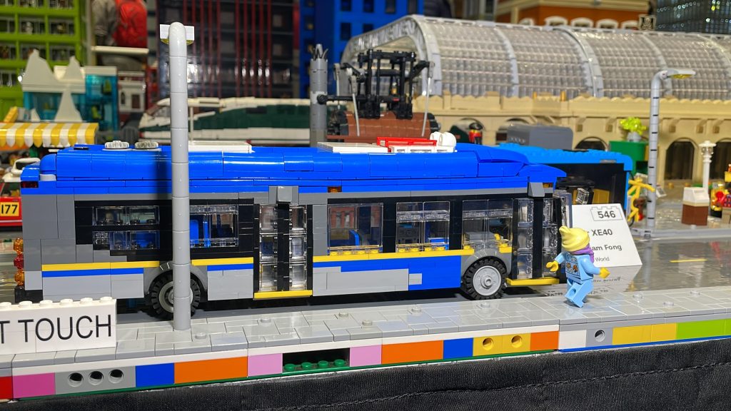 a small bus made entirely of lego. 2023 BrickCan Lego exhibition