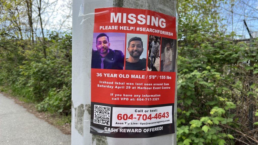 A missing person poster for Irshaad Ikbal is seen in Vancouver