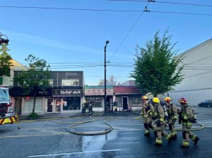 fire fighters seen outside of a vancouver restaurnt that went up in flames saturday morning