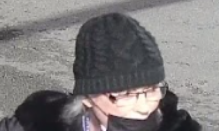 a woman wearing a black toque and glasses is a suspect in a coquitlam rcmp investigation