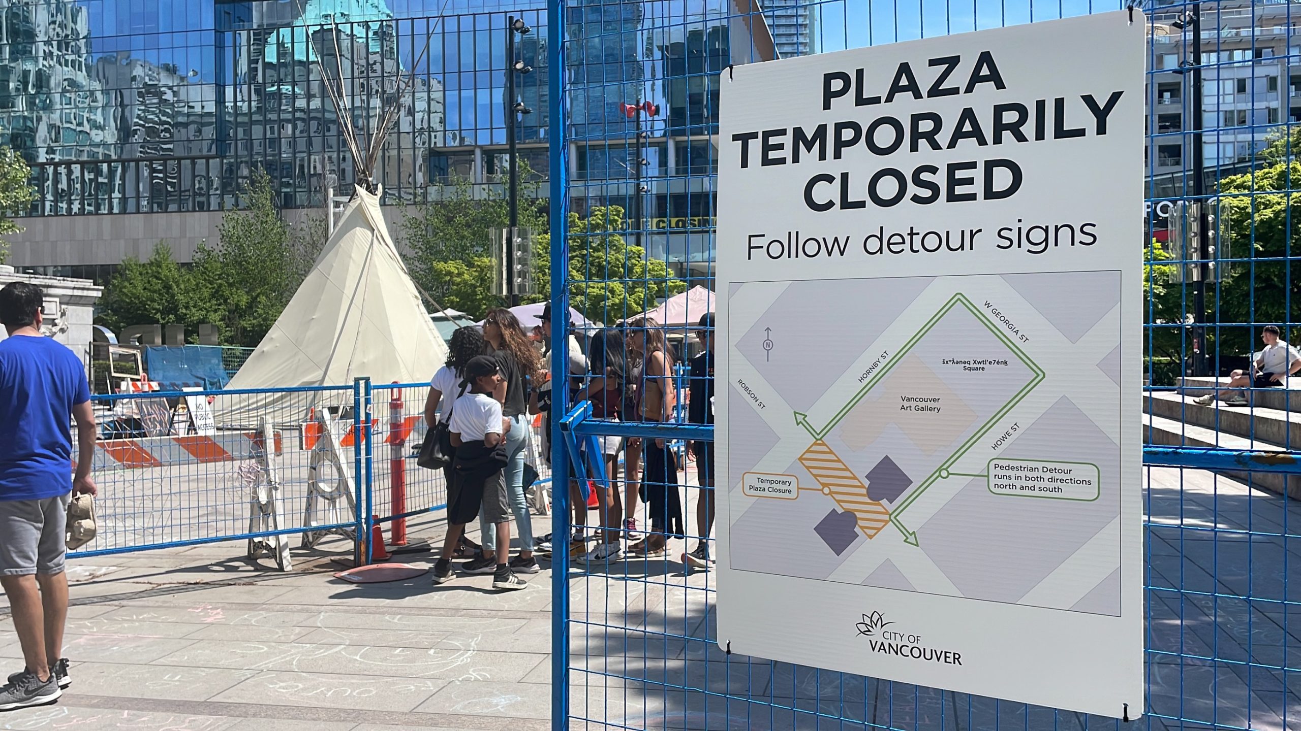 Fencing up around the residential school vigil at the Vancouver Art Gallery as the memorial is removed on May 19, 2023