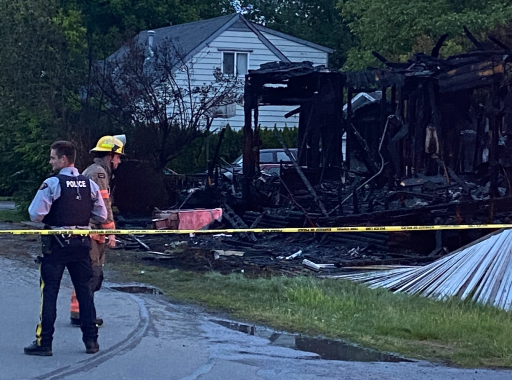 A "high-risk" incident in Chilliwack is now over. Police are sharing little detail, but a house can be seen to be destroyed by fire. (Mike Lloyd/CityNews)