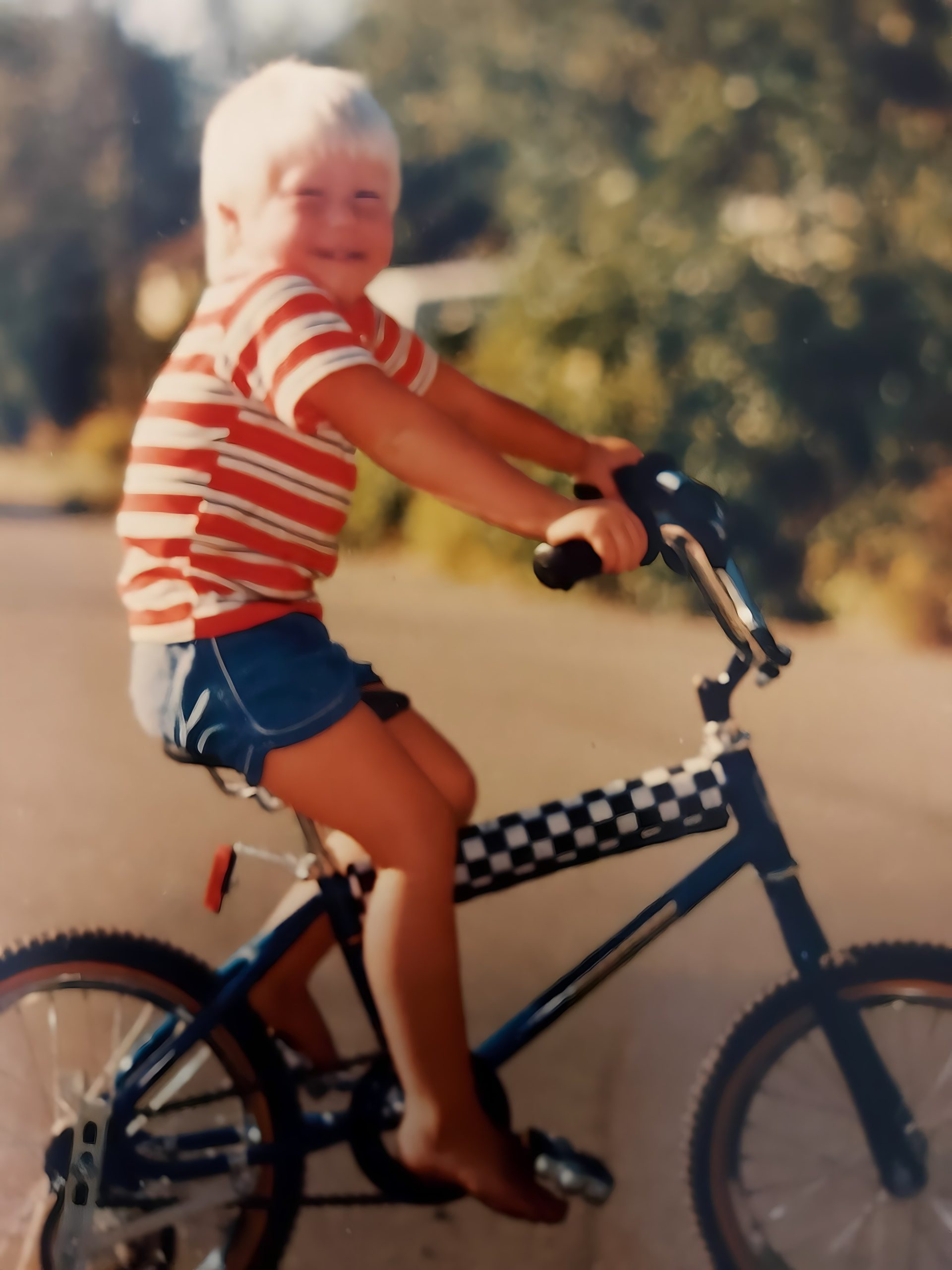 Tyler was one of the victims found at the site of the Whiskey Creek incident in Nov. 2020. In this childhood photo, he's pictured riding a bike. 