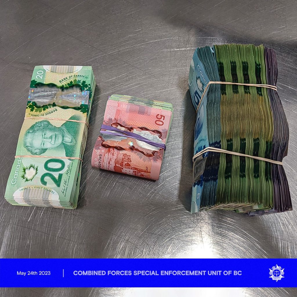 Approximately $24,000 in cash that was seized by police as part of a 2020 drug bust.