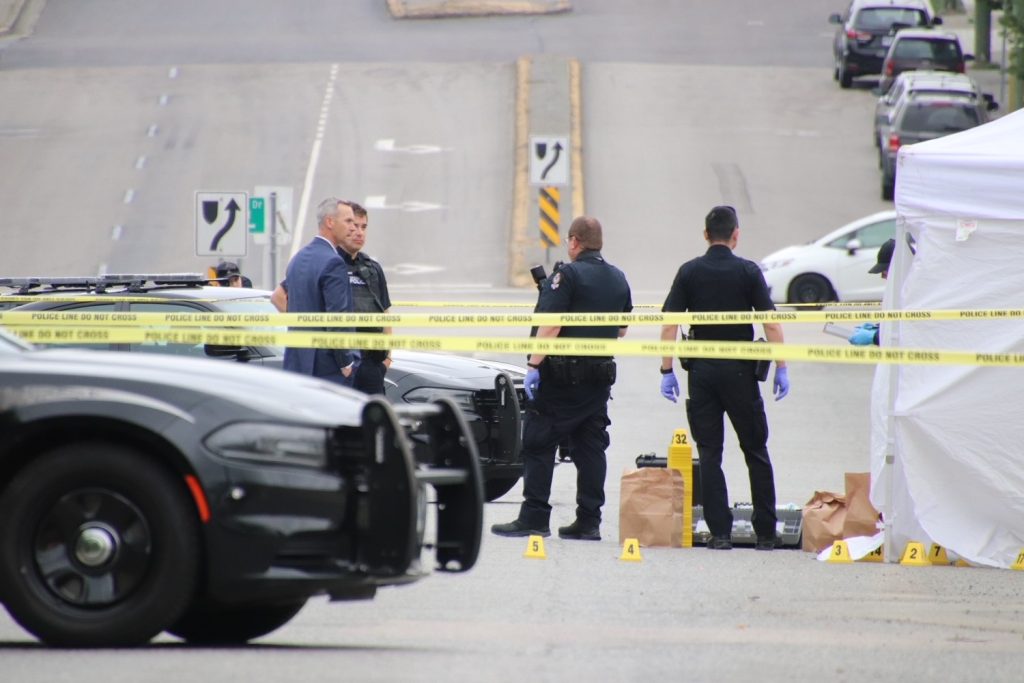 police officers and caution tape seen at a south vancouver crime scene