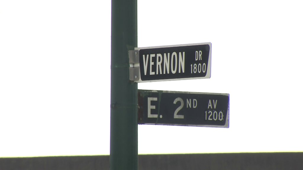 Vernon Drive and East 2nd Street street sign