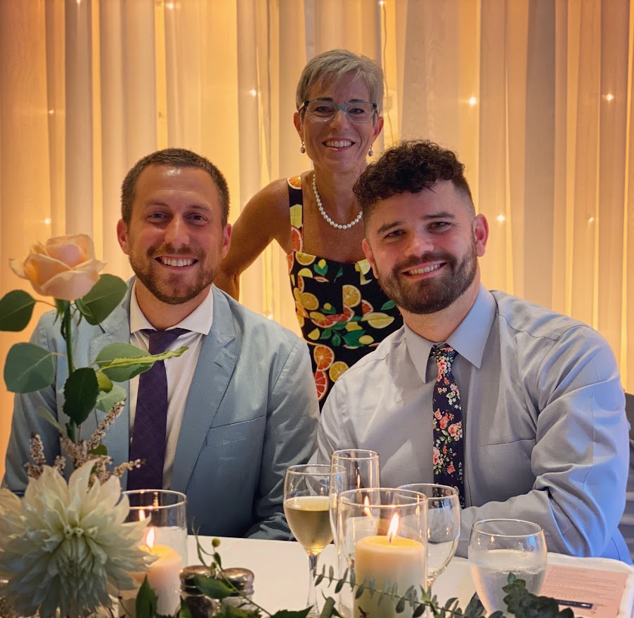 Kyle and Aaron Demes, pictured with Aaron's mother Selina Robinson, have been searching for a surrogate since they got married in 2021